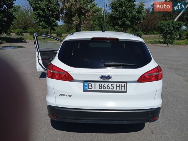 Белый Форд Фокус, объемом двигателя 1.5 л и пробегом 245 тыс. км за 7900 $, фото 2 на Automoto.ua