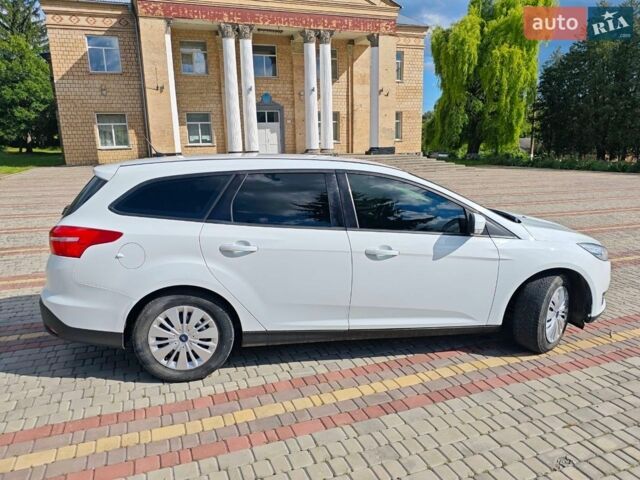 Белый Форд Фокус, объемом двигателя 1.5 л и пробегом 249 тыс. км за 8300 $, фото 7 на Automoto.ua
