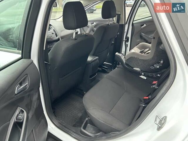 Белый Форд Фокус, объемом двигателя 1 л и пробегом 169 тыс. км за 8700 $, фото 19 на Automoto.ua