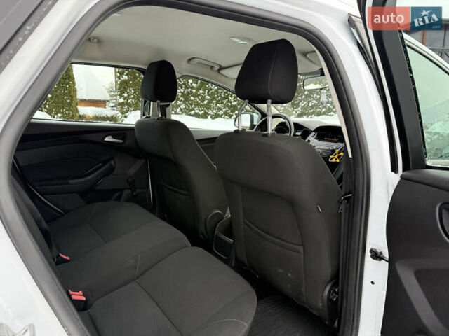 Белый Форд Фокус, объемом двигателя 1 л и пробегом 251 тыс. км за 7400 $, фото 28 на Automoto.ua