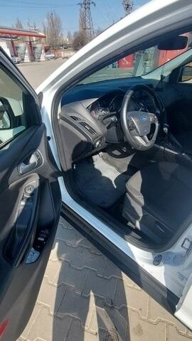 Белый Форд Фокус, объемом двигателя 1.5 л и пробегом 254 тыс. км за 8300 $, фото 14 на Automoto.ua