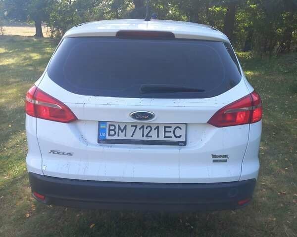 Белый Форд Фокус, объемом двигателя 1 л и пробегом 170 тыс. км за 7600 $, фото 18 на Automoto.ua