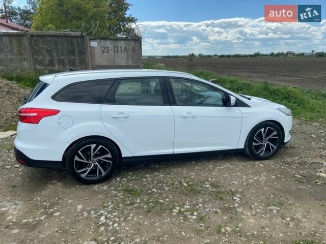 Белый Форд Фокус, объемом двигателя 1 л и пробегом 252 тыс. км за 5600 $, фото 18 на Automoto.ua
