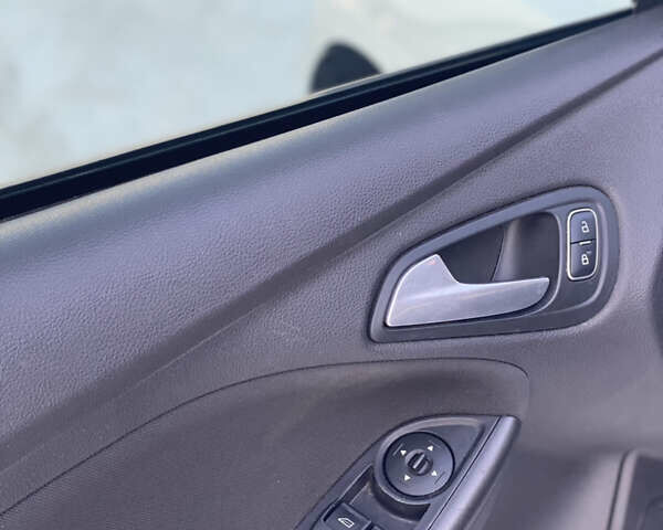 Білий Форд Фокус, об'ємом двигуна 1.5 л та пробігом 253 тис. км за 8299 $, фото 20 на Automoto.ua