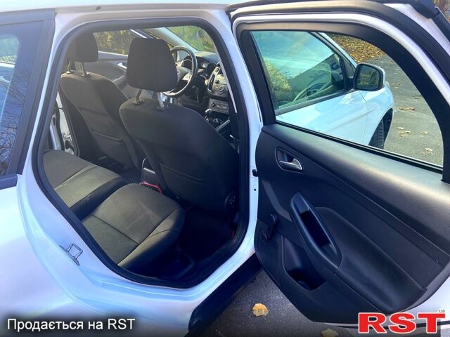 Белый Форд Фокус, объемом двигателя 1 л и пробегом 134 тыс. км за 7150 $, фото 11 на Automoto.ua