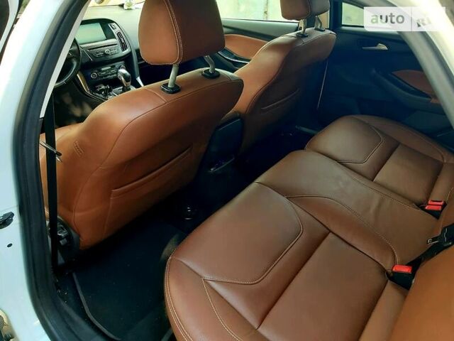 Белый Форд Фокус, объемом двигателя 1.5 л и пробегом 161 тыс. км за 12800 $, фото 17 на Automoto.ua