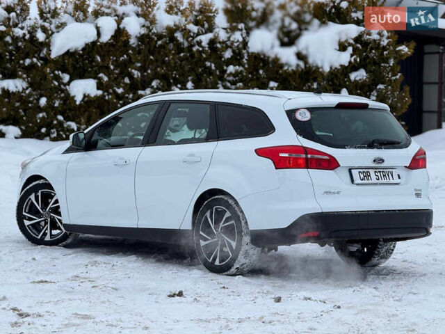 Белый Форд Фокус, объемом двигателя 1 л и пробегом 251 тыс. км за 7400 $, фото 14 на Automoto.ua