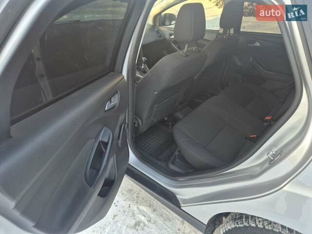 Білий Форд Фокус, об'ємом двигуна 1.5 л та пробігом 243 тис. км за 8999 $, фото 4 на Automoto.ua