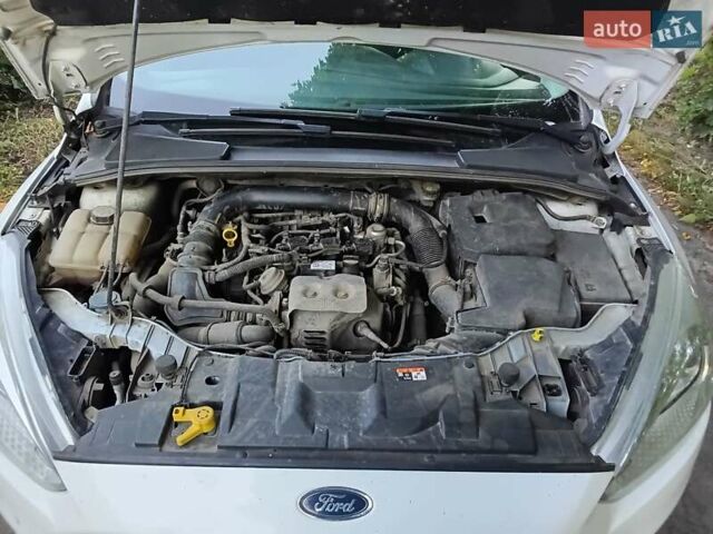 Белый Форд Фокус, объемом двигателя 1 л и пробегом 177 тыс. км за 7000 $, фото 7 на Automoto.ua