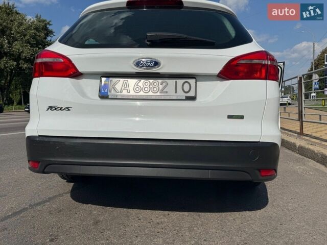 Білий Форд Фокус, об'ємом двигуна 1 л та пробігом 165 тис. км за 8600 $, фото 3 на Automoto.ua