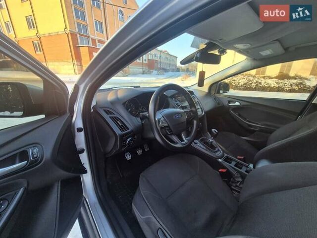 Білий Форд Фокус, об'ємом двигуна 1.5 л та пробігом 243 тис. км за 8999 $, фото 1 на Automoto.ua
