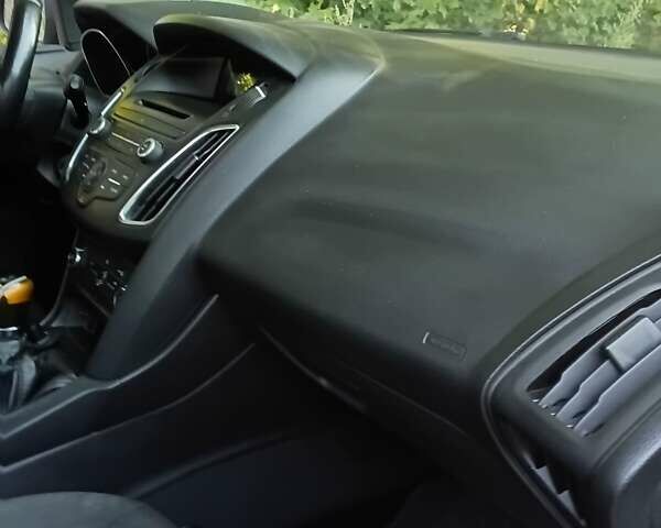 Белый Форд Фокус, объемом двигателя 1 л и пробегом 177 тыс. км за 7000 $, фото 2 на Automoto.ua