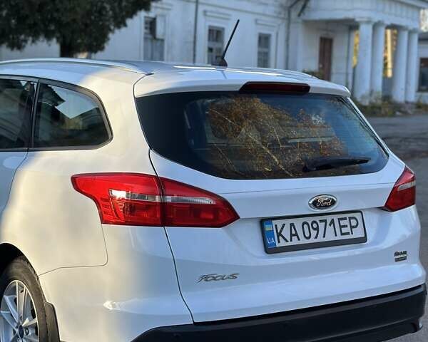 Белый Форд Фокус, объемом двигателя 1 л и пробегом 83 тыс. км за 7400 $, фото 7 на Automoto.ua