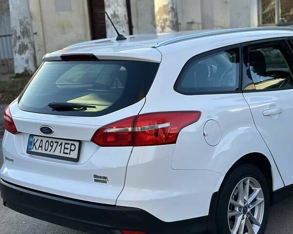 Белый Форд Фокус, объемом двигателя 1 л и пробегом 83 тыс. км за 7400 $, фото 6 на Automoto.ua