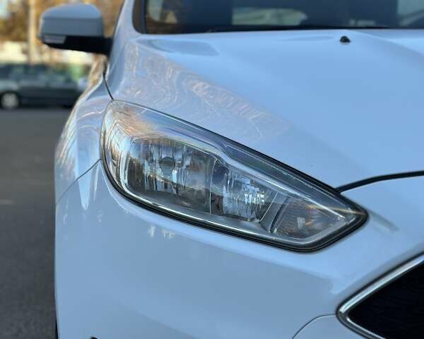 Белый Форд Фокус, объемом двигателя 1 л и пробегом 83 тыс. км за 7400 $, фото 10 на Automoto.ua