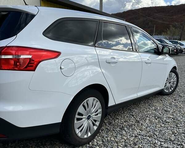 Белый Форд Фокус, объемом двигателя 1.5 л и пробегом 89 тыс. км за 11000 $, фото 12 на Automoto.ua