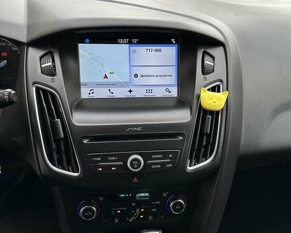 Белый Форд Фокус, объемом двигателя 1.5 л и пробегом 89 тыс. км за 11000 $, фото 34 на Automoto.ua