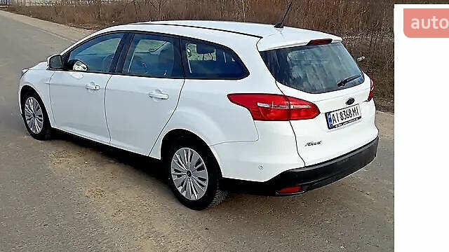 Белый Форд Фокус, объемом двигателя 1.5 л и пробегом 262 тыс. км за 9000 $, фото 2 на Automoto.ua