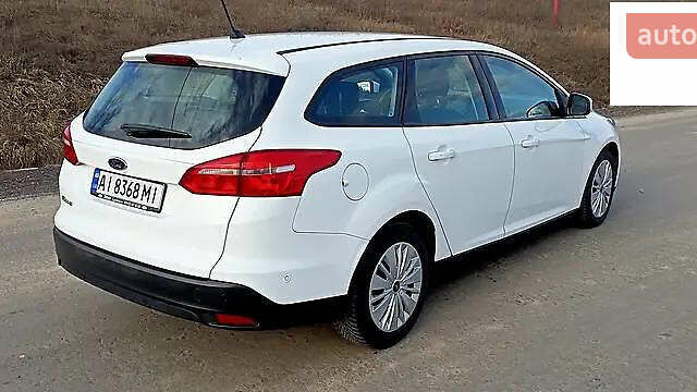 Белый Форд Фокус, объемом двигателя 1.5 л и пробегом 262 тыс. км за 9000 $, фото 3 на Automoto.ua