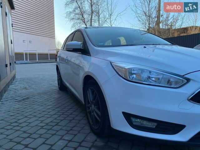 Білий Форд Фокус, об'ємом двигуна 1.5 л та пробігом 215 тис. км за 9400 $, фото 4 на Automoto.ua