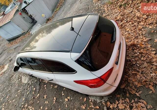 Белый Форд Фокус, объемом двигателя 1 л и пробегом 75 тыс. км за 11600 $, фото 5 на Automoto.ua