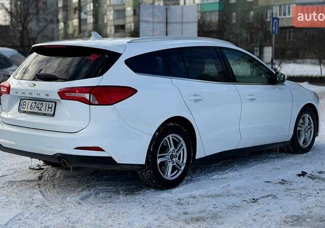 Белый Форд Фокус, объемом двигателя 1.5 л и пробегом 239 тыс. км за 12100 $, фото 4 на Automoto.ua