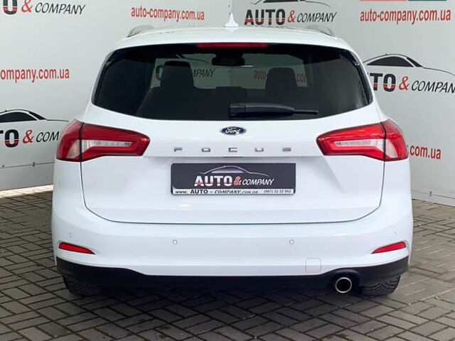 Білий Форд Фокус, об'ємом двигуна 2 л та пробігом 180 тис. км за 14950 $, фото 3 на Automoto.ua