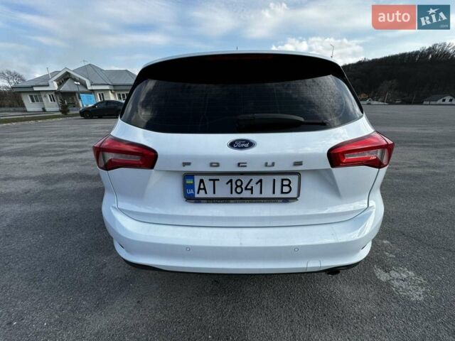 Білий Форд Фокус, об'ємом двигуна 1.5 л та пробігом 230 тис. км за 11400 $, фото 3 на Automoto.ua