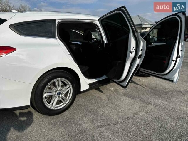 Білий Форд Фокус, об'ємом двигуна 1.5 л та пробігом 230 тис. км за 11400 $, фото 8 на Automoto.ua