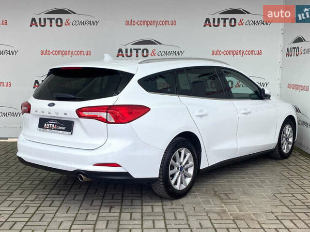 Білий Форд Фокус, об'ємом двигуна 2 л та пробігом 180 тис. км за 14950 $, фото 2 на Automoto.ua