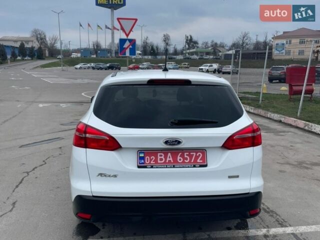 Белый Форд Фокус, объемом двигателя 1 л и пробегом 154 тыс. км за 8500 $, фото 10 на Automoto.ua