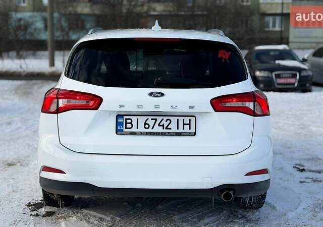 Белый Форд Фокус, объемом двигателя 1.5 л и пробегом 239 тыс. км за 12100 $, фото 5 на Automoto.ua