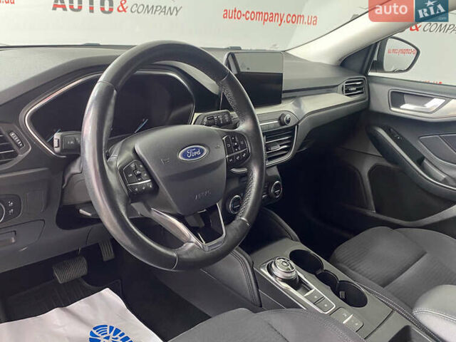 Білий Форд Фокус, об'ємом двигуна 2 л та пробігом 180 тис. км за 14950 $, фото 5 на Automoto.ua