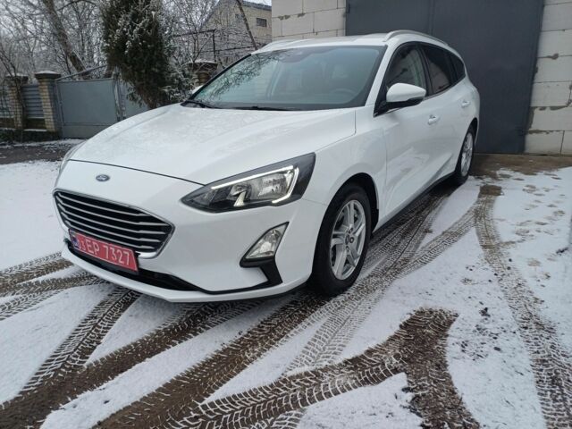 Белый Форд Фокус, объемом двигателя 1.5 л и пробегом 175 тыс. км за 12800 $, фото 3 на Automoto.ua