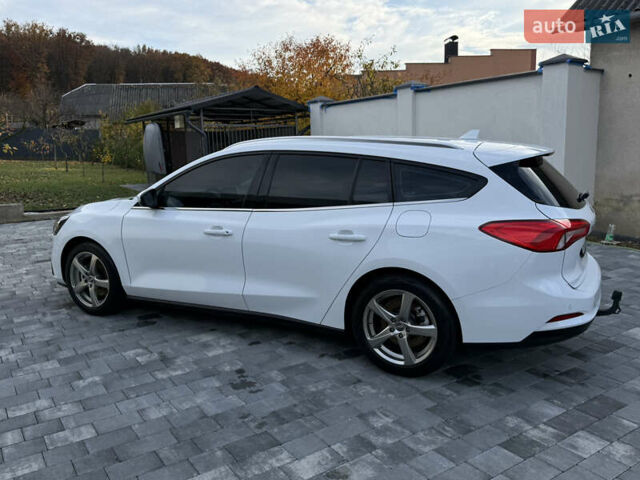 Білий Форд Фокус, об'ємом двигуна 1.5 л та пробігом 205 тис. км за 12400 $, фото 1 на Automoto.ua