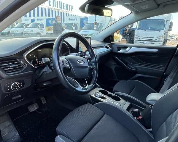 Белый Форд Фокус, объемом двигателя 2 л и пробегом 205 тыс. км за 14900 $, фото 13 на Automoto.ua
