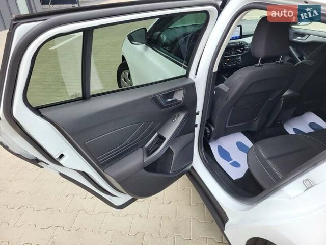 Белый Форд Фокус, объемом двигателя 1.5 л и пробегом 190 тыс. км за 14500 $, фото 19 на Automoto.ua