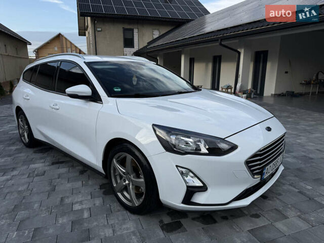 Білий Форд Фокус, об'ємом двигуна 1.5 л та пробігом 205 тис. км за 12400 $, фото 5 на Automoto.ua