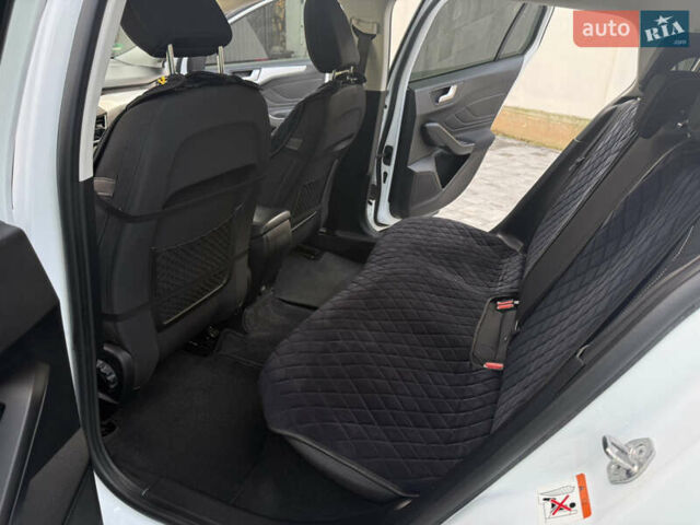 Білий Форд Фокус, об'ємом двигуна 1.5 л та пробігом 205 тис. км за 12400 $, фото 15 на Automoto.ua