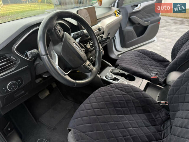 Білий Форд Фокус, об'ємом двигуна 1.5 л та пробігом 205 тис. км за 12400 $, фото 14 на Automoto.ua