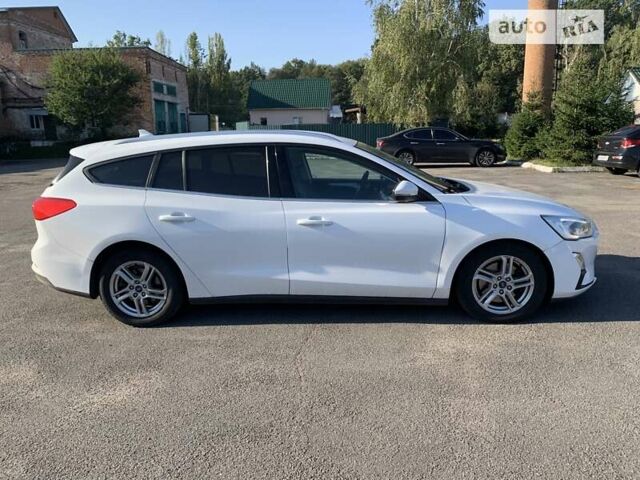 Белый Форд Фокус, объемом двигателя 1.5 л и пробегом 218 тыс. км за 13000 $, фото 5 на Automoto.ua