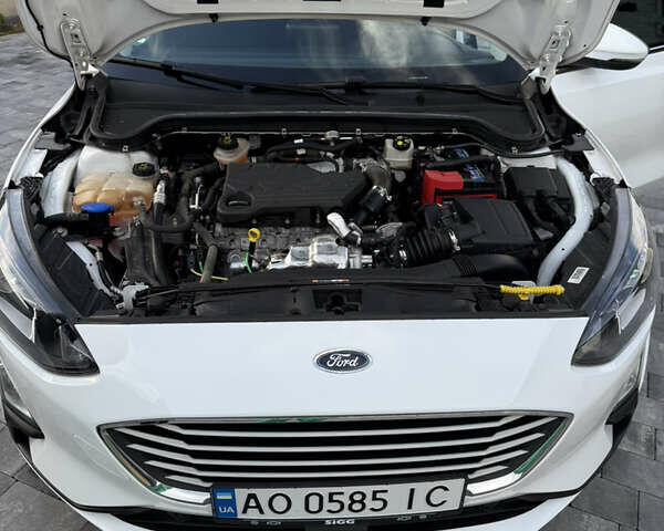 Білий Форд Фокус, об'ємом двигуна 1.5 л та пробігом 205 тис. км за 12400 $, фото 19 на Automoto.ua
