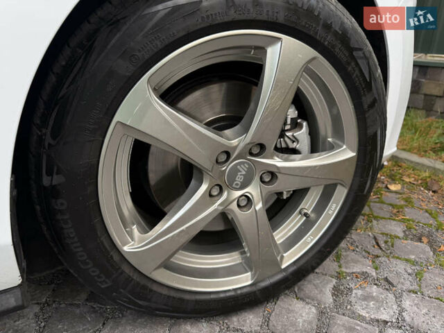 Білий Форд Фокус, об'ємом двигуна 1.5 л та пробігом 205 тис. км за 12400 $, фото 17 на Automoto.ua