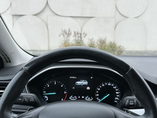 Белый Форд Фокус, объемом двигателя 1.5 л и пробегом 231 тыс. км за 12900 $, фото 6 на Automoto.ua