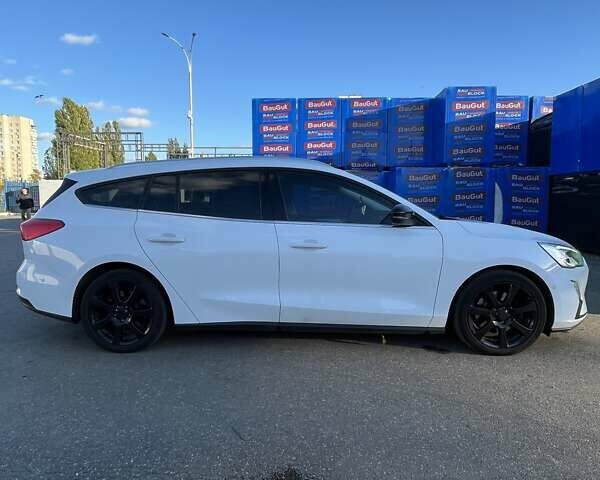 Белый Форд Фокус, объемом двигателя 2 л и пробегом 205 тыс. км за 14900 $, фото 5 на Automoto.ua