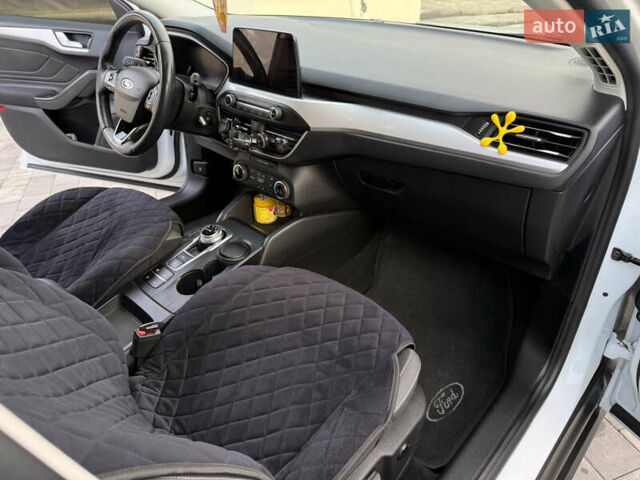 Білий Форд Фокус, об'ємом двигуна 1.5 л та пробігом 205 тис. км за 12400 $, фото 7 на Automoto.ua