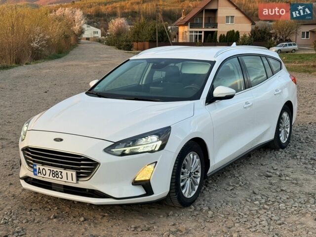Белый Форд Фокус, объемом двигателя 2 л и пробегом 245 тыс. км за 12999 $, фото 5 на Automoto.ua