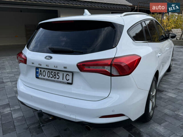 Білий Форд Фокус, об'ємом двигуна 1.5 л та пробігом 205 тис. км за 12400 $, фото 3 на Automoto.ua