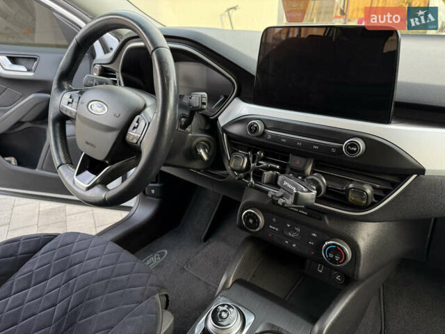 Білий Форд Фокус, об'ємом двигуна 1.5 л та пробігом 205 тис. км за 12400 $, фото 6 на Automoto.ua