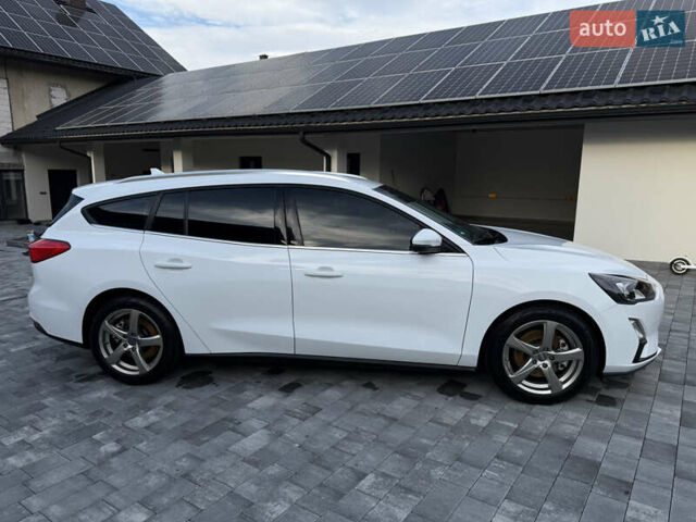 Білий Форд Фокус, об'ємом двигуна 1.5 л та пробігом 205 тис. км за 12400 $, фото 4 на Automoto.ua